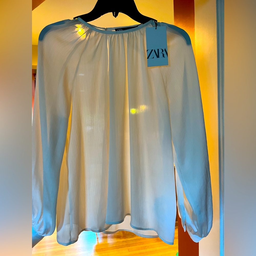 New with tags. Zara ivory long sleeve blouse. Women’s XS